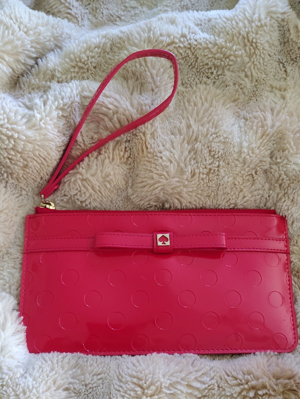 kate spade hot pink patent wristlet with bow and polka dots